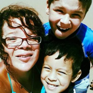 Happy family at the beach together
