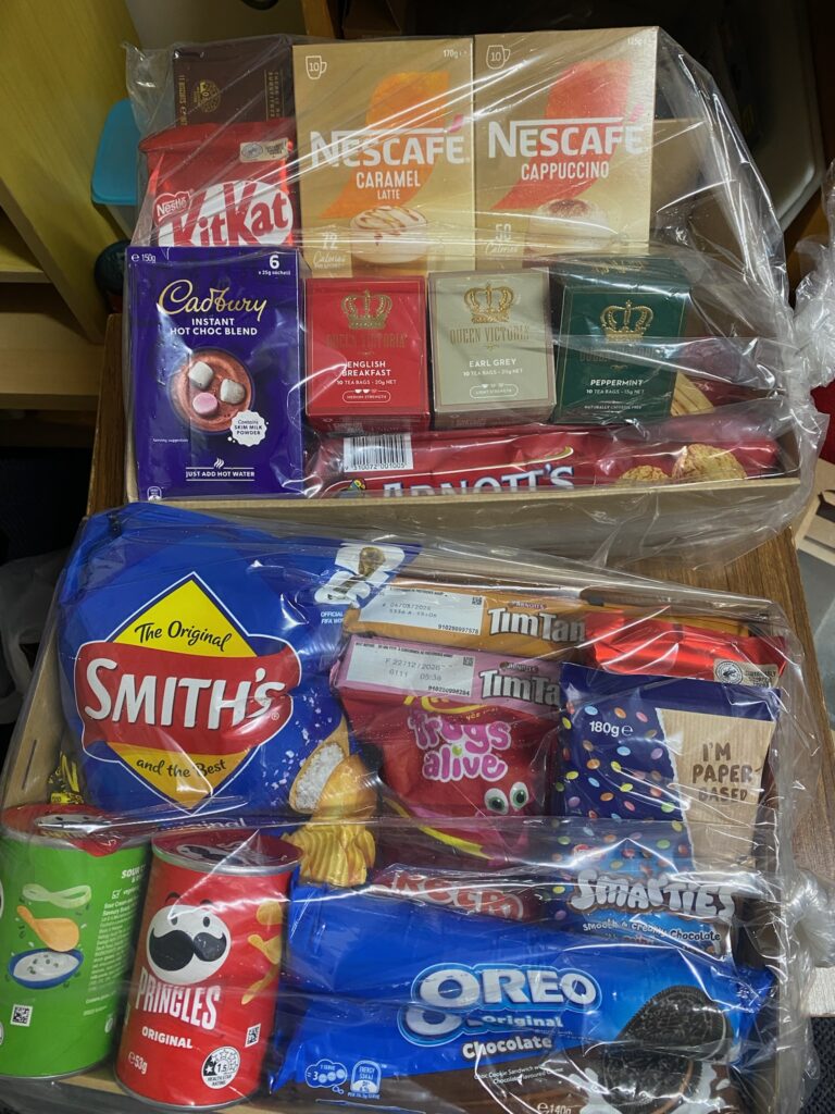 Snack hamper with coffee, tea, biscuits and chips